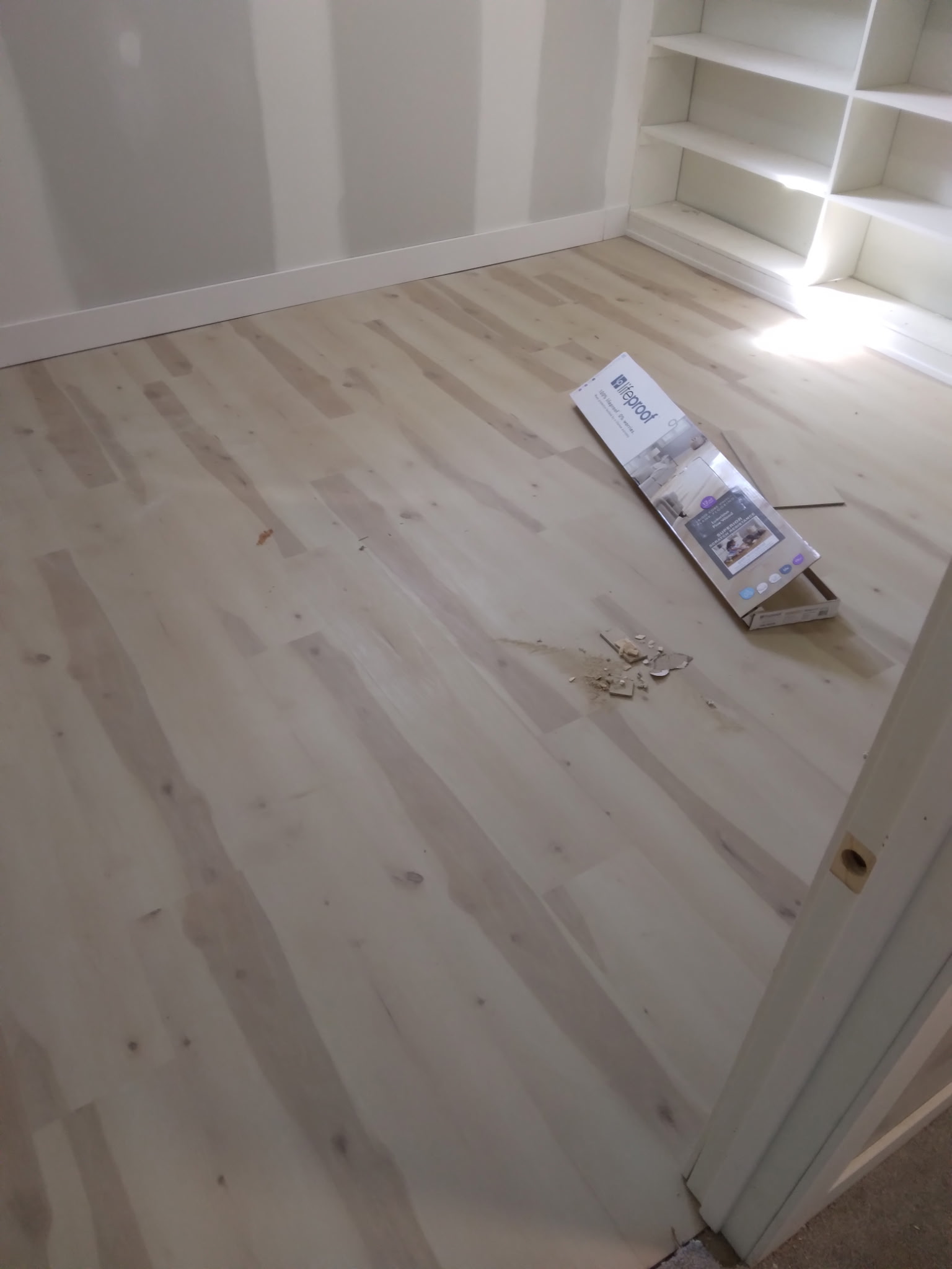 Luxury vinyl plank with built-in shelves