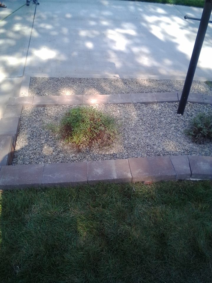 Concrete & gravel landscaping with pavers