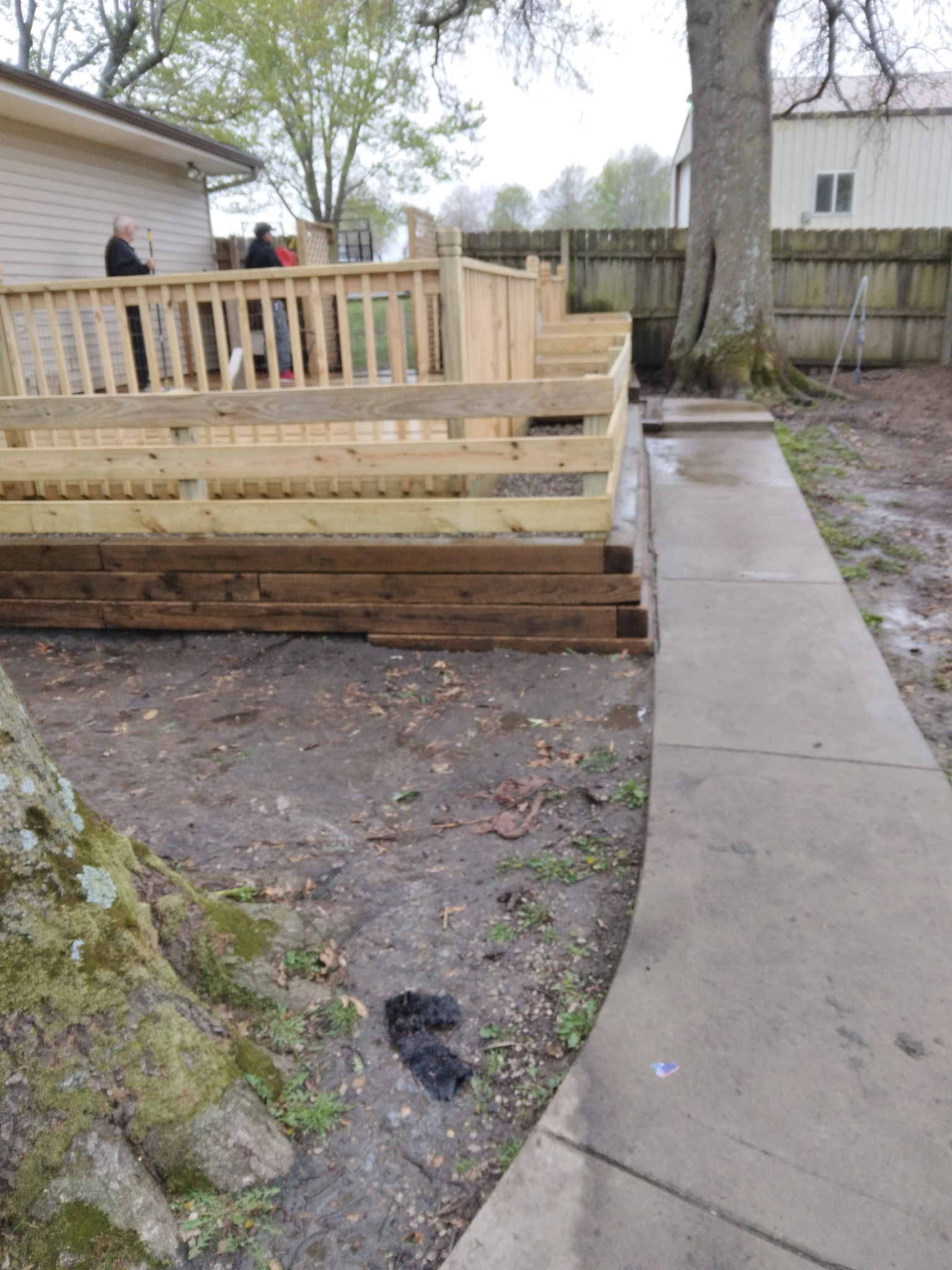 Deck build with concrete pathway